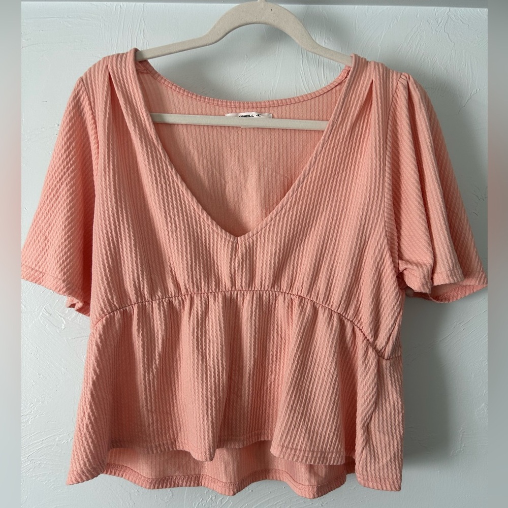 ONEILL Peach Pink V-Neck Peplum Ribbed Bliuse
